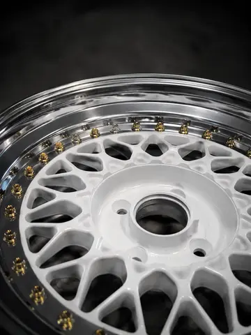 Polished three-piece wheel being assembled